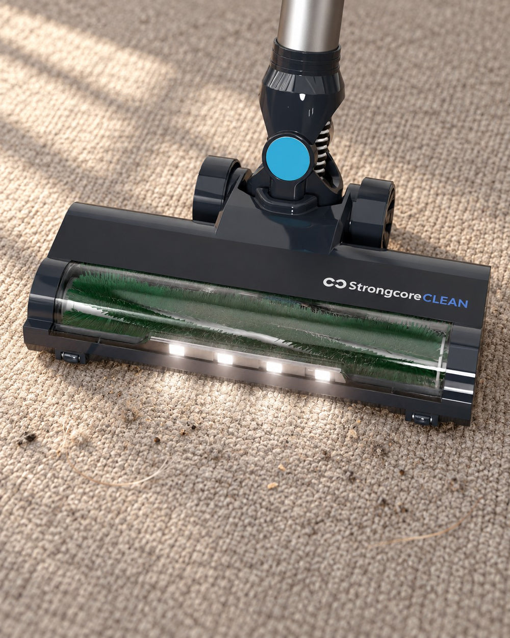 CLEAN's floor brush on a low-pile rug with loose hair and dust.